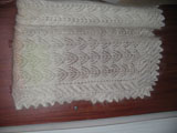 A downy open-work shawl